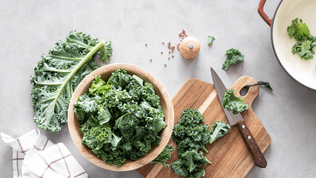 Kale on chopping board to make a kale smoothie for dogs